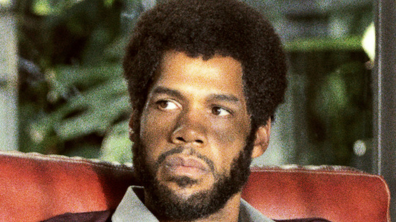 Solomon Hughes as Kareem Abdul-Jabbar serious