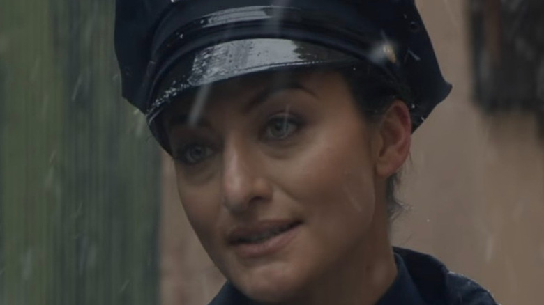Officer Fucci in rain in Blue Bloods