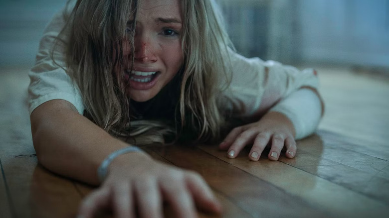 Norma screaming on the floor in Pet Sematary Bloodlines