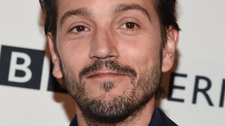 Diego Luna at event smiling