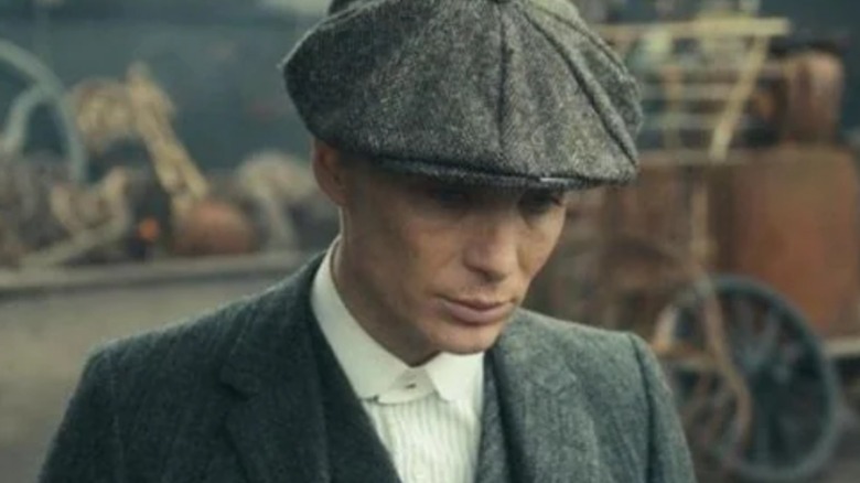 Tommy Shelby wearing a Peaky Blinders hat