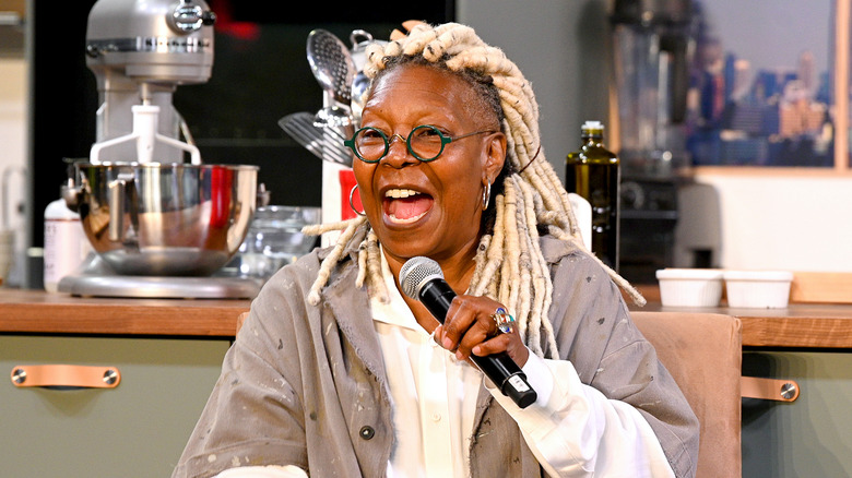 Whoopi Goldberg looking happy