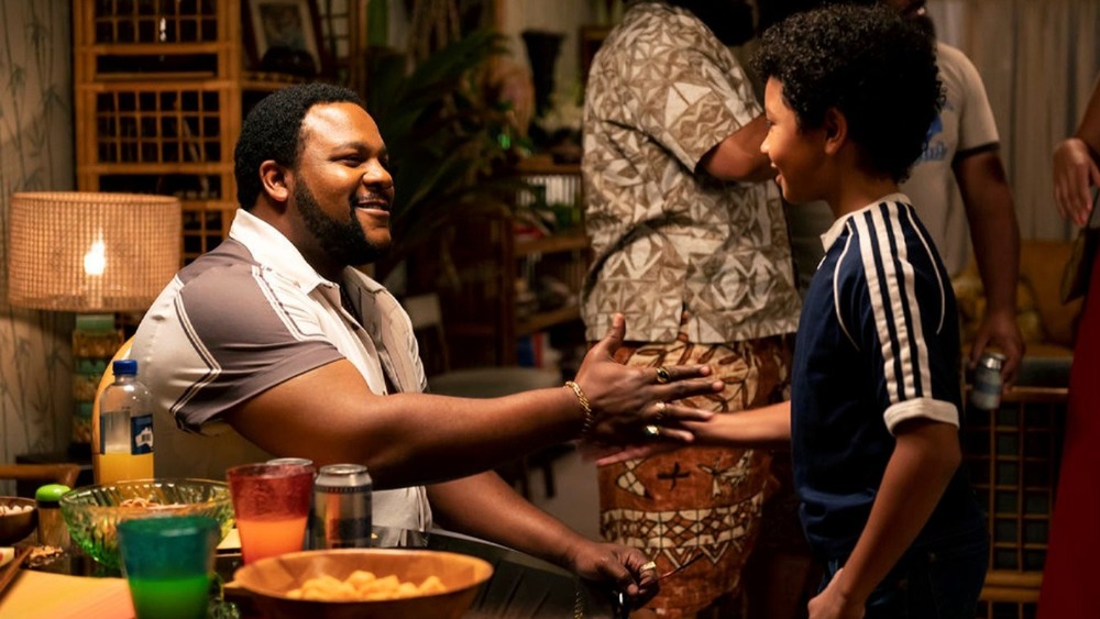 Junkyard Dog high fiving Dwayne Johnson