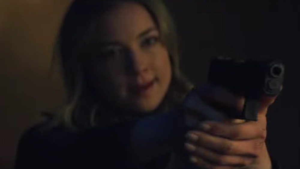 Sharon Carter pointing gun