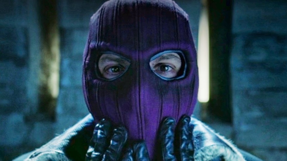 Baron Zemo touching face