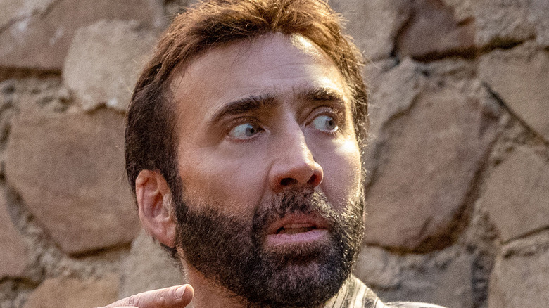 Nicolas Cage looking shocked in The Unbearable Weight of Massive Talent 