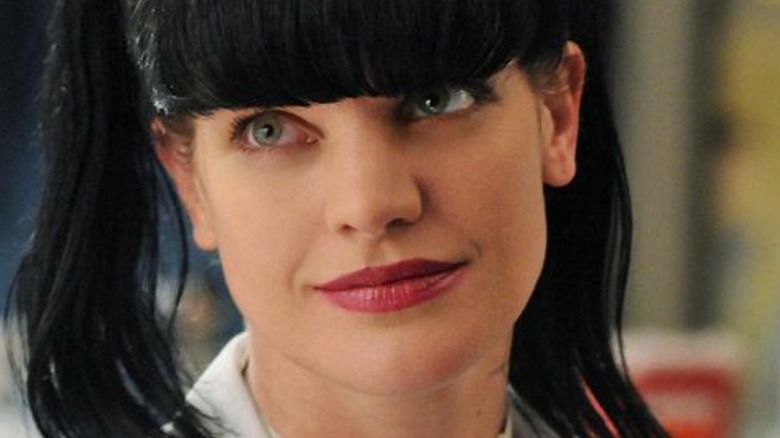 Abby Sciuto smirking