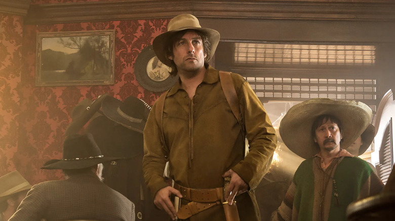 Tommy White Knife enters the saloon