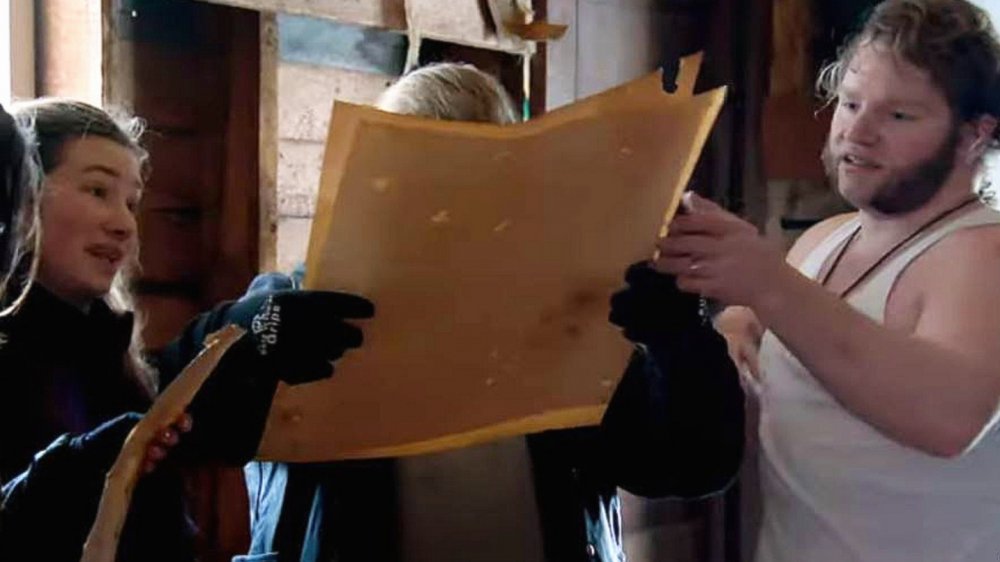 Sophie and Gabe Brown look at their treasure maps on Alaskan Bush Peple