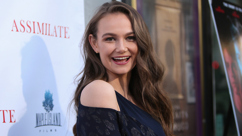 Andi Matichak attends a premiere