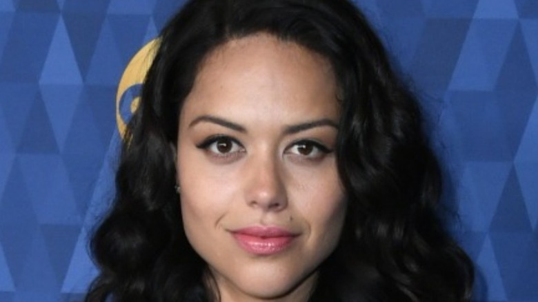 Alyssa Diaz smirking