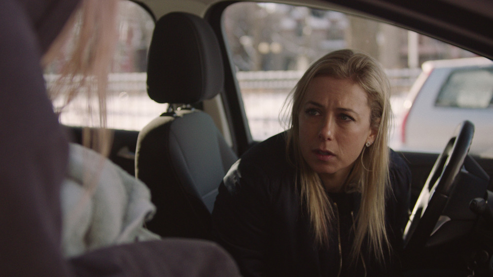 Anita (Iliza Shlesinger) sits in a car in Pieces of a Woman