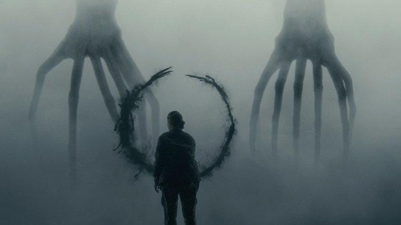 Amy Adams as Louise Banks, facing the aliens in Arrival