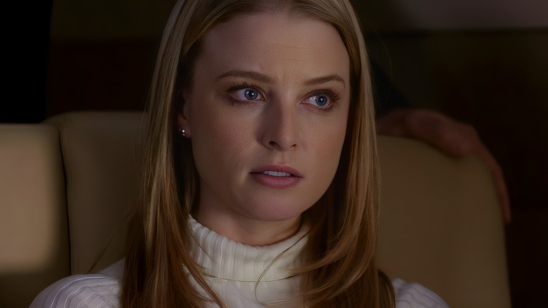 Ashley Seaver white sweater looking worried