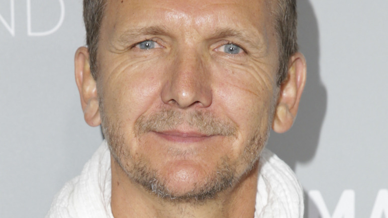 Sebastian Roche smiling