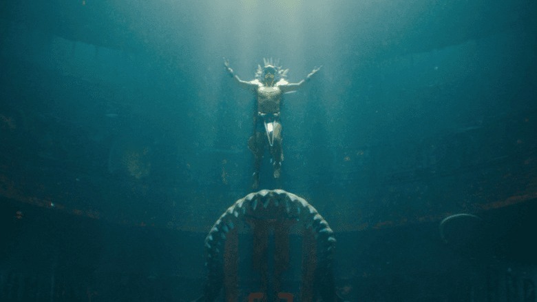 Namor raising his arms