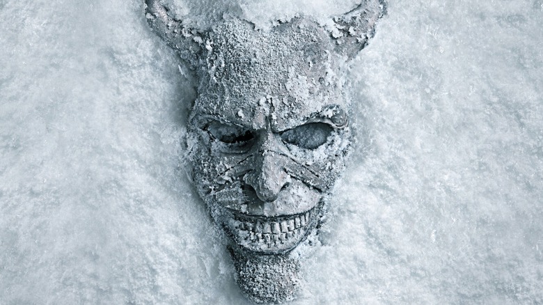 The Grabber mask from The Black Phone 2 in the snow