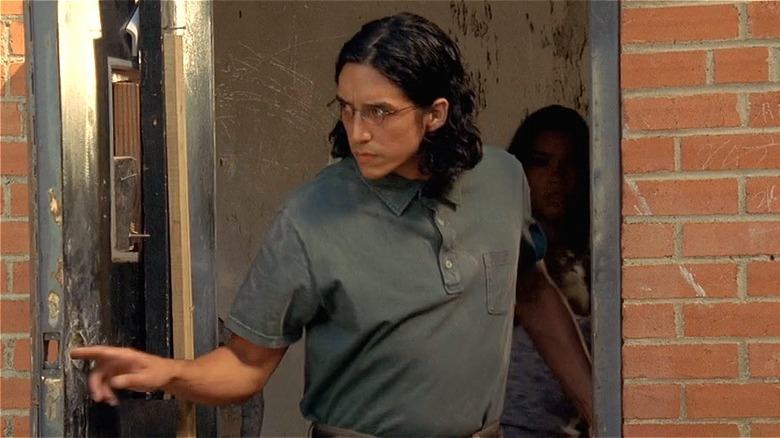 Eduardo checks the door 