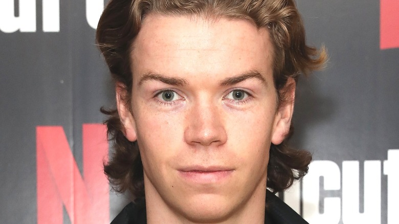 Will Poulter looking directly at the camera