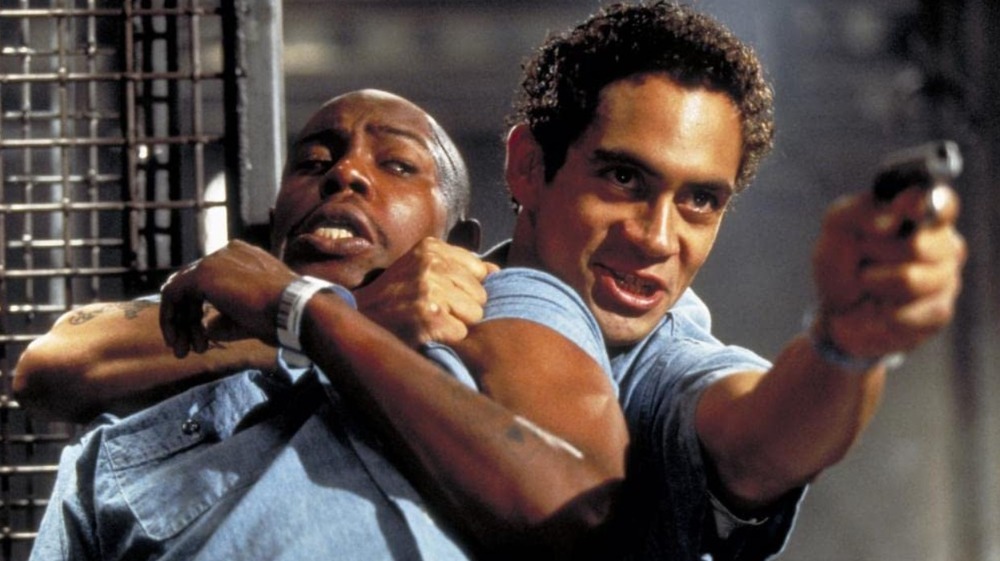 Agent Sims holds Pinball Parker hostage