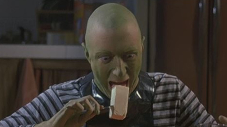 Alien Orphan eating butter