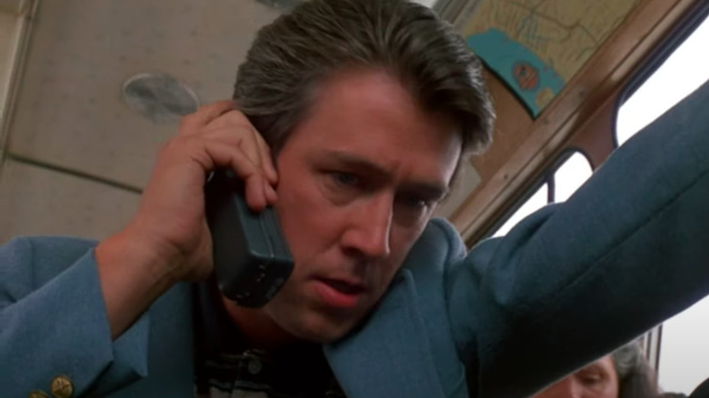Alan Ruck talking on the phone