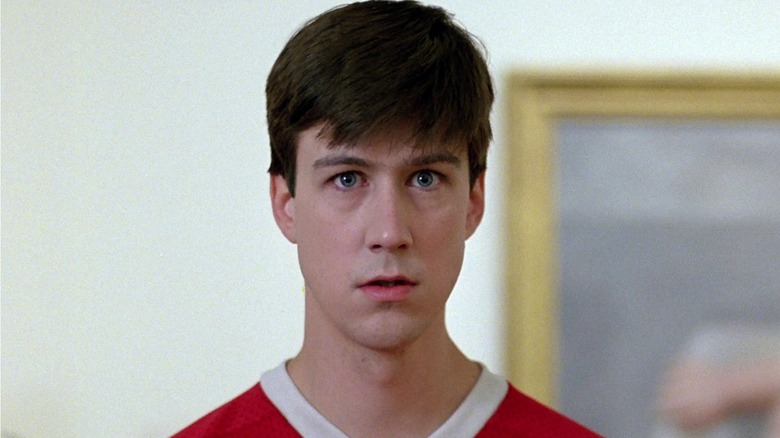 Cameron looking at art mesmerized