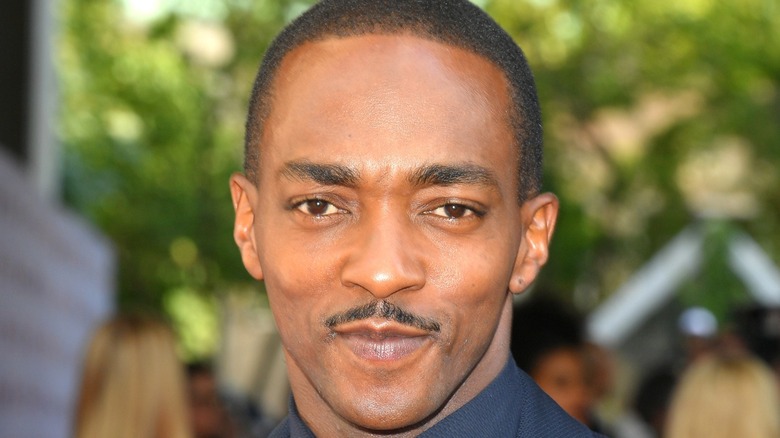 Anthony Mackie smiling outside