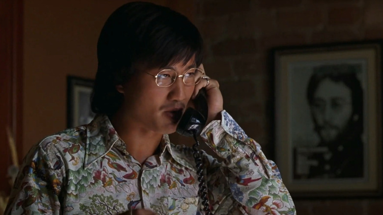 Ben Fong-Torres talking on the phone
