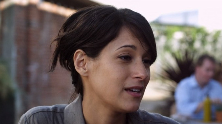 Angelique Cabral speaking to someone