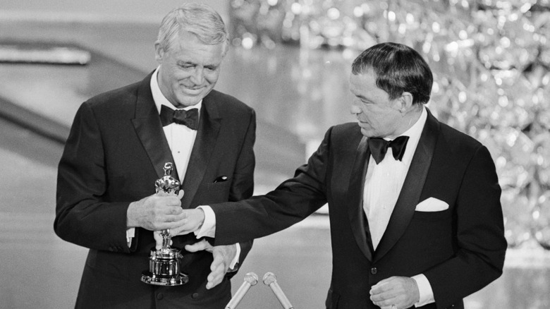 Cary Grant accepts Oscar