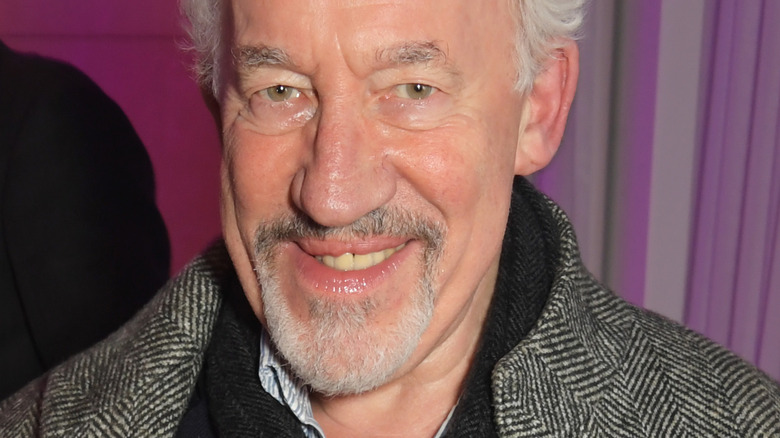 Simon Callow smiles