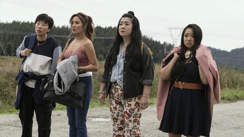 The leads of Joy Ride stuck in the middle of nowhere (2023)