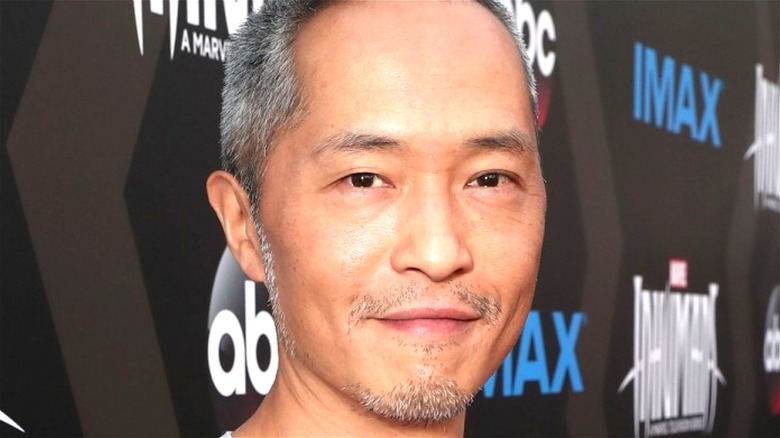 Ken Leung smiling