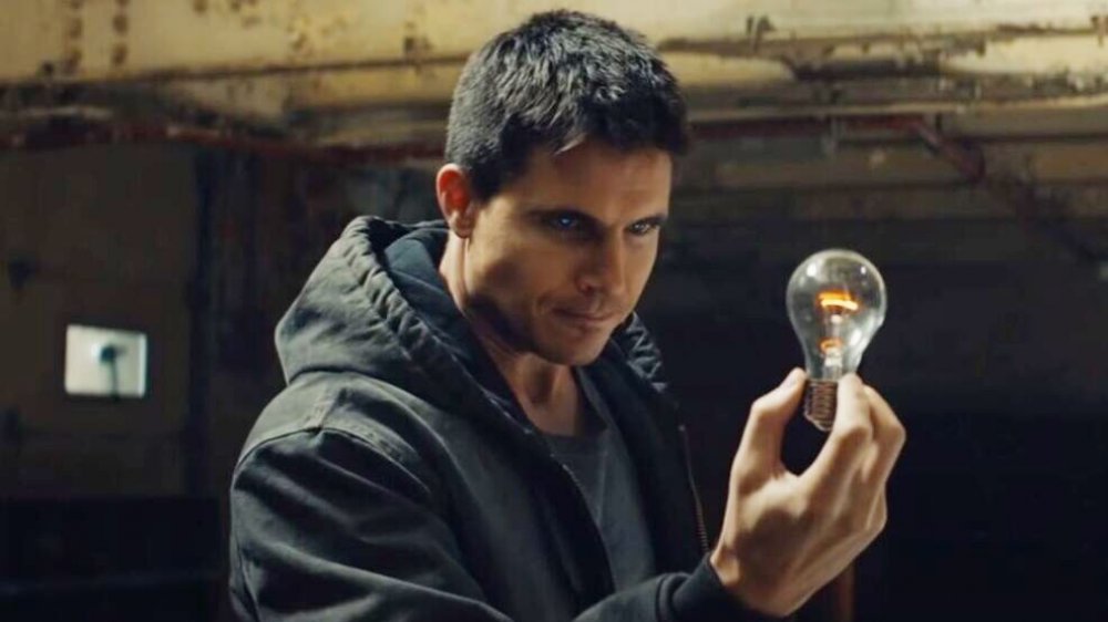 Robbie Amell as Connor Reed in Code 8