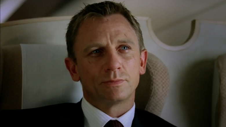 Daniel Craig smiling on train