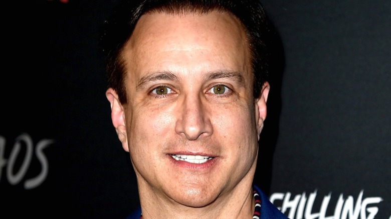 Bronson Pinchot smiling at event