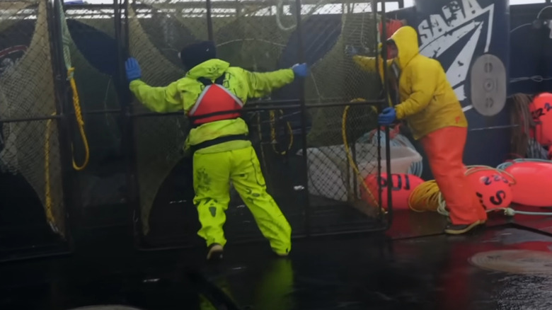 Crewmates prepare equipment in Deadliest Catch