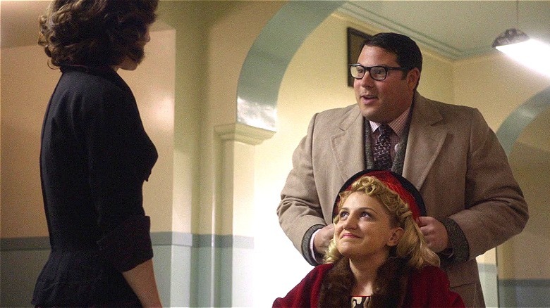 Gene and Betty looking at Virginia