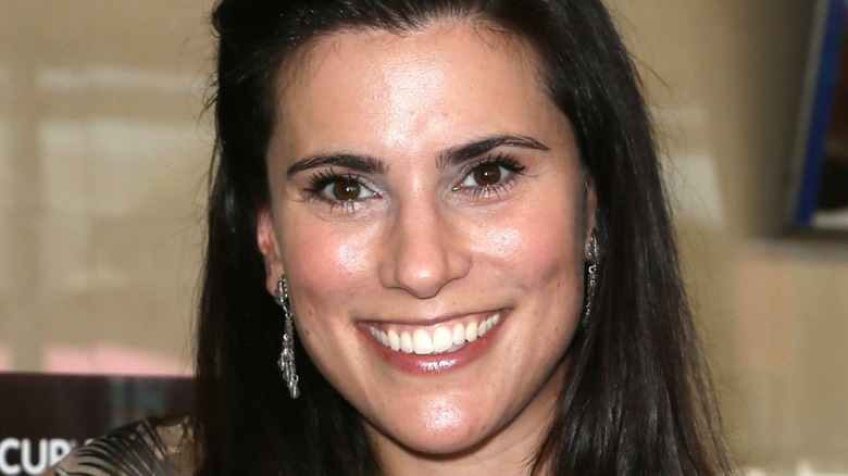 Milena Govich on red carpet