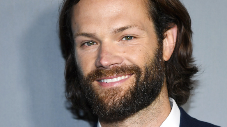 Padalecki smiles at event 