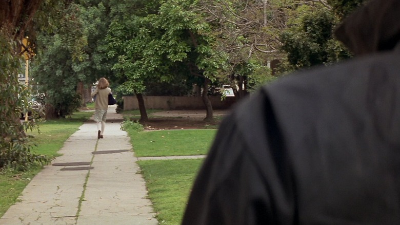 Michael Myers stares down Jamie Lee Curtis as Laurie Strode in Halloween.
