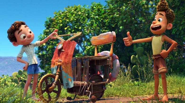 Luca and Bruno preparing to ride their makeshift scooter in Luca (2021)
