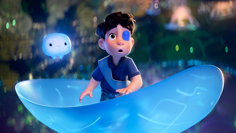 Elio with a shocked expression next to OOOO in Elio (2025)
