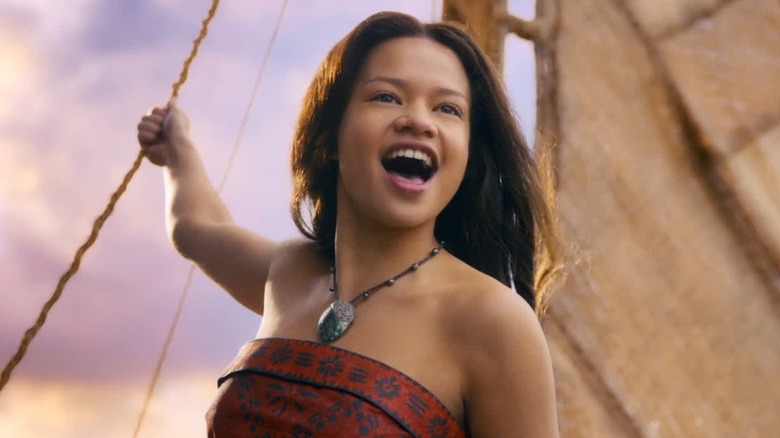 Moana singing on her boat in the live-action 