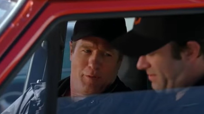 Gregg Henry talking to Thomas Jane