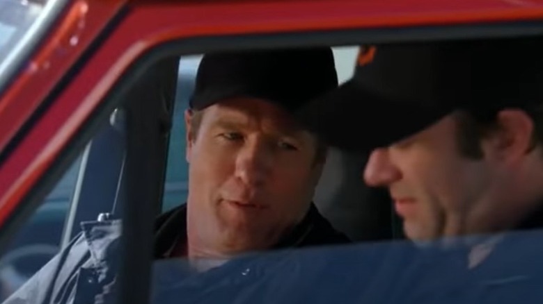 Gregg Henry talking to Thomas Jane