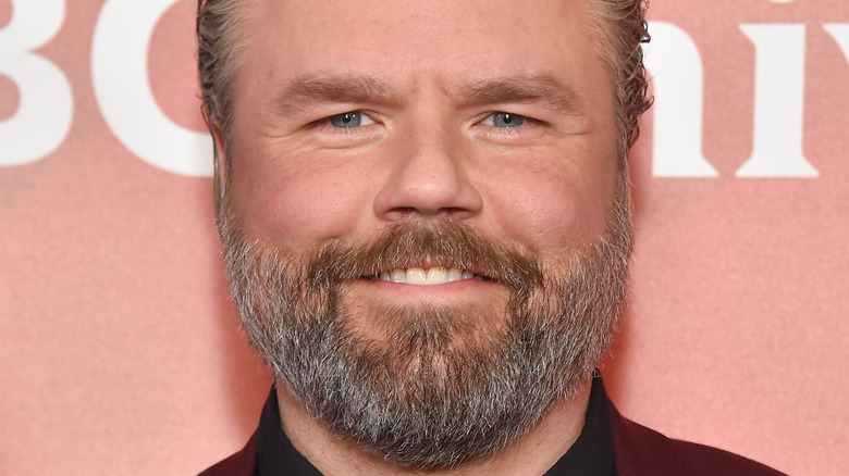 Tyler Labine smiling