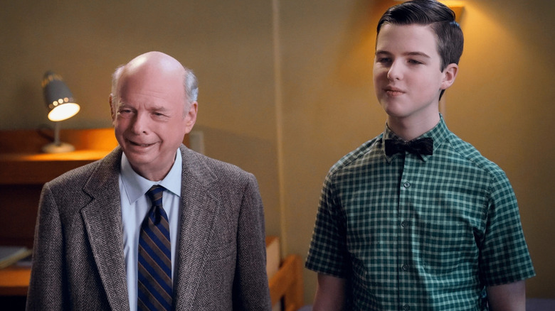 John Sturgis standing with young Sheldon Cooper