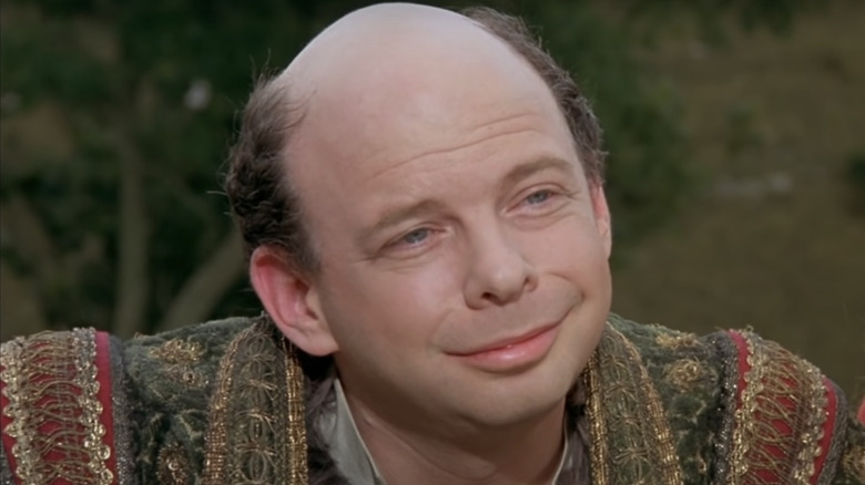 Wallace Shawn smirking in The Princess Bride